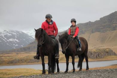 family riding iceland